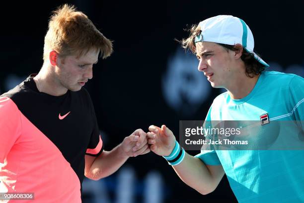 Aidan McHugh of Great Britain and Timofey Skatov of Russia compete in their boy's doubles match against Igor Gimenez of Brazil and Sangeet Sridhar of...