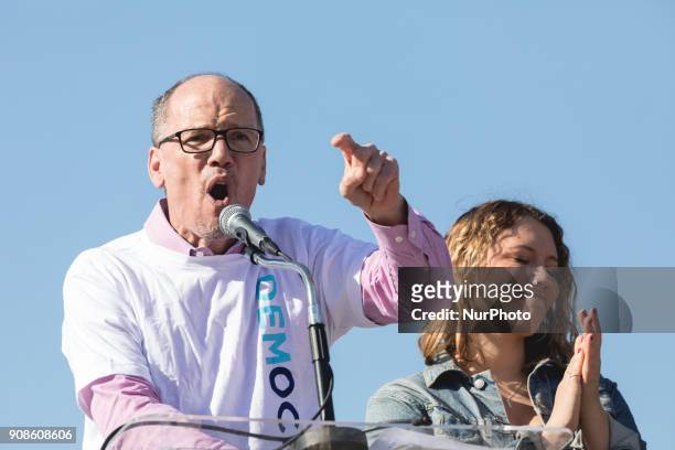 Chair Tom Perez, standing with his daughter Amalia Perez, speaks to people gathered on the steps of the Lincoln Memorial for the &quot;Women's March...