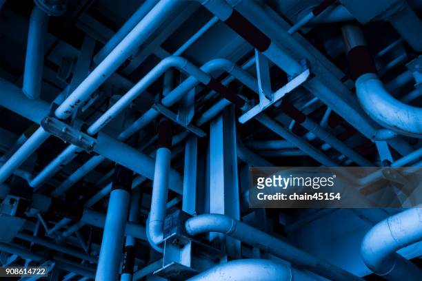 pipeline industry in blue tone color. - water supply stock-fotos und bilder