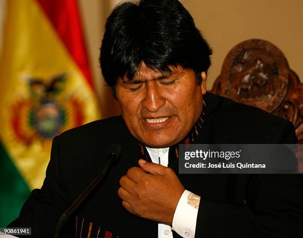 Bolivian President Evo Morales Ayma attends a press conference at the 'Salon de los Espejos del Palacio de Gobierno' after returning from a...
