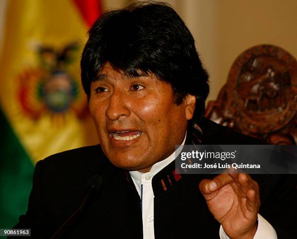 Bolivian President Evo Morales Ayma attends a press conference at the 'Salon de los Espejos del Palacio de Gobierno' after returning from a...