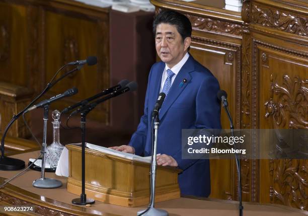 Shinzo Abe, Japan's prime minister, delivers his policy speech during a plenary session at the lower house of parliament in Tokyo, Japan, on Monday,...