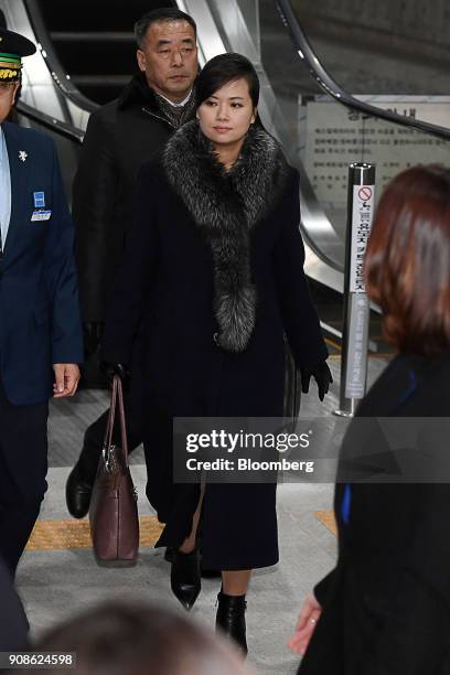 Hyon Song Wol, a North Korean pop star, party member and head of an advance team for North Koreas art troupe, center, arrives at Gangneung station in...