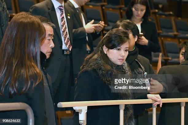Hyon Song Wol, a North Korean pop star, party member and head of an advance team for North Koreas art troupe, center, arrives at the Gangneung Arts...