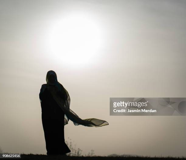 muslim woman - hijab woman from behind stock-fotos und bilder