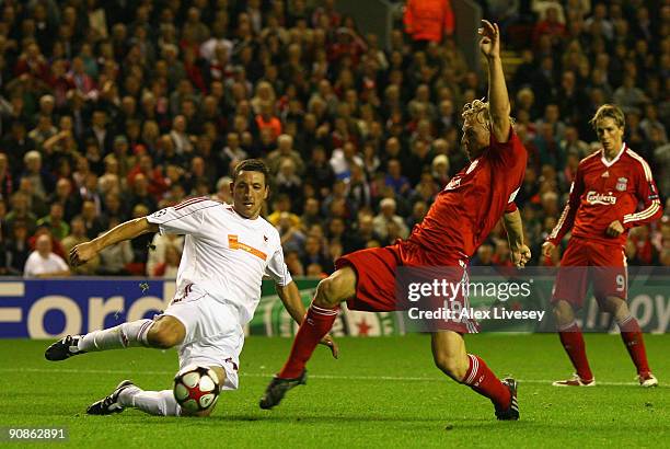 Dirk Kuyt of Liverpool scores the opening goal during the UEFA Champions League Group E match between Liverpool and Debrecen VSC at Anfield on...