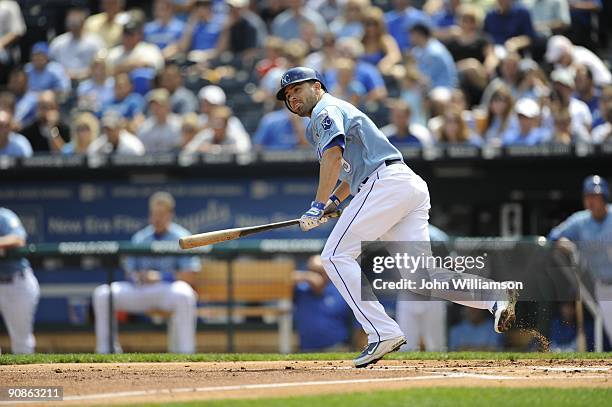 David DeJesus of the Kansas City Royals bats and runs to first base from the batter's box during the game against the Los Angeles Angels of Anaheim...