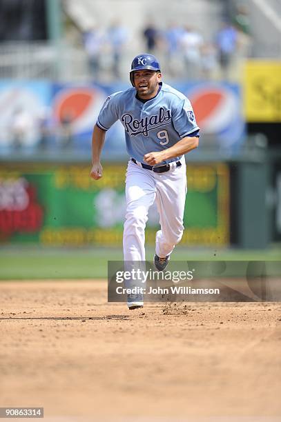 David DeJesus of the Kansas City Royals runs the bases as he advances to third base during the game against the Los Angeles Angels of Anaheim at...