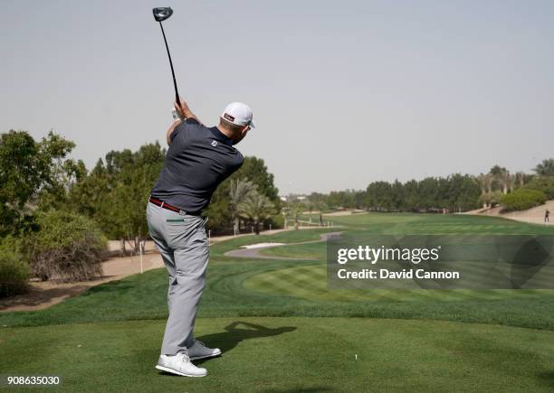 Stephen Gallacher of Scotland plays a driver during the final round of the Abu Dhabi HSBC Golf Championship at Abu Dhabi Golf Club on January 21,...