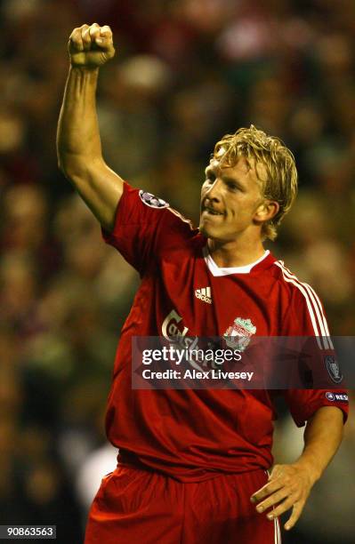 Dirk Kuyt of Liverpool celebrates scoring the opening goal during the UEFA Champions League Group E match between Liverpool and Debrecen VSC at...