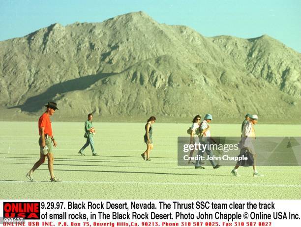 Black Rock Desert, Nevada. The British team clear the track of small rocks in the Black Rock Desert