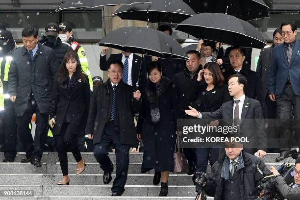 Hyon Song-Wol , leader of North Korea's popular Moranbong band, leaves after she inspected the Korea National Theater for planned musical concerts...