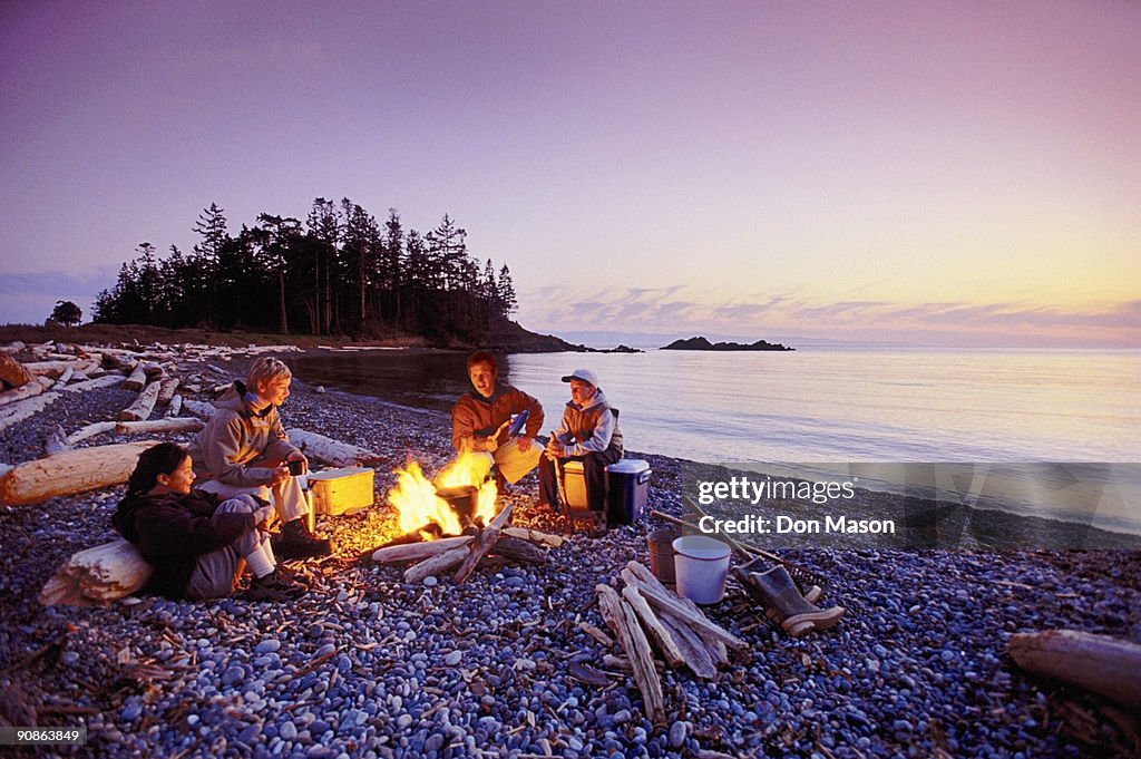People by a campfire