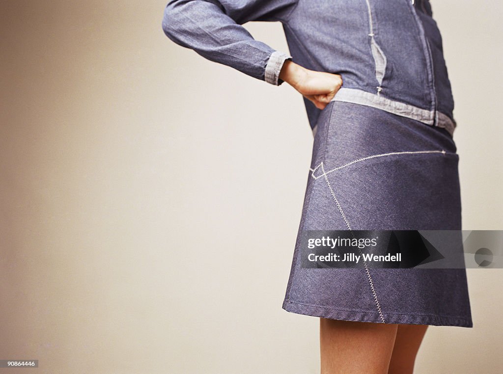 Woman in denim dress