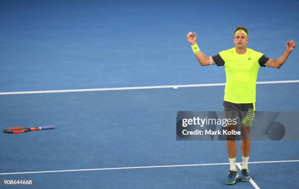 Tennys Sandgren of the United States celebrates winning match point in his fourth round match against Dominic Thiem of Austria on day eight of the...