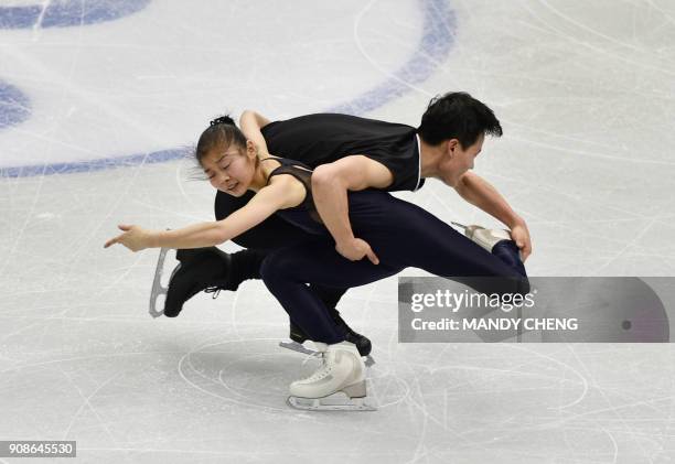 Ryom Tae-Ok and Kim Ju-Sik of North Korea attend a practice session for the ice dance free dance competition at the ISU Four Continents Figure...