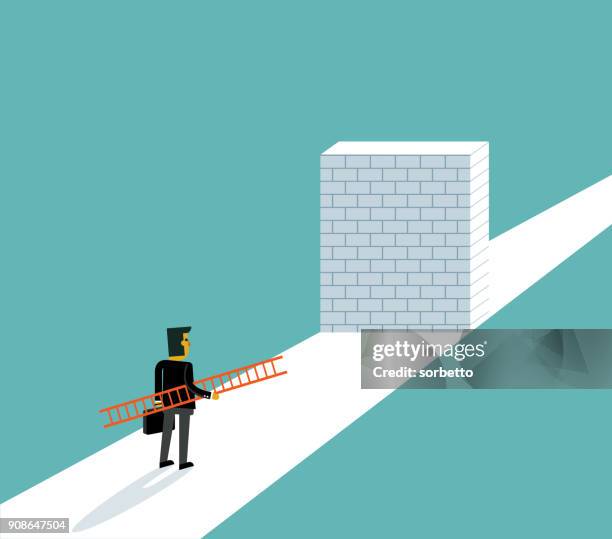 businessman standing in front of a large brick wall - conquering adversity stock illustrations