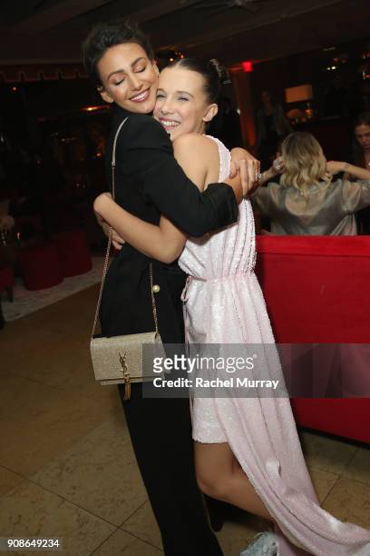 Actor Millie Bobby Brown hugs Michelle Keegan as she attends Netflix Hosts The SAG After Party At The Sunset Tower Hotel on January 21, 2018 in West...