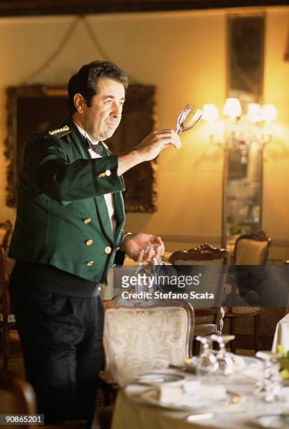 waiter with clean glasses - hotel uniform stock-fotos und bilder