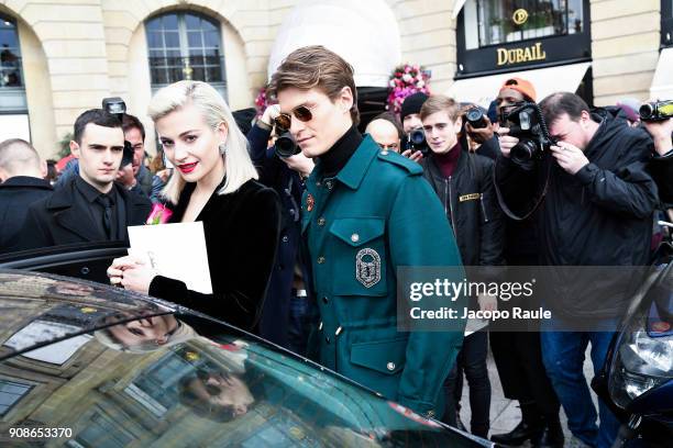 Pixie Lott and Oliver Cheshire are seen arriving at Schiaparelli Fashion show during Paris Fashion Week : Haute Couture Spring/Summer 2018 on January...