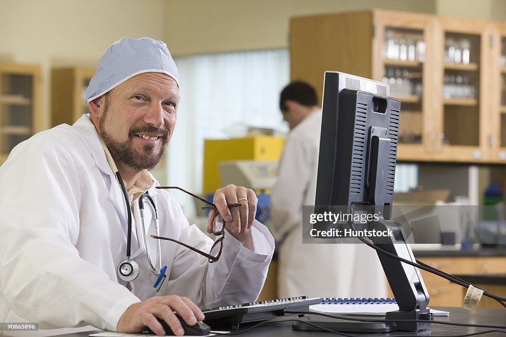 Lab Technician Working A Computer High-Res Stock Photo - Getty Images