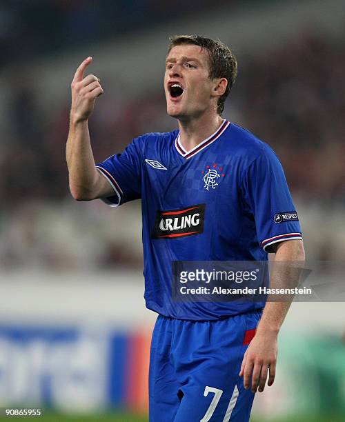 Steven Davis of Glasgow reacts during the UEFA Champions League Group G match between VfB Stuttgart and Rangers FC on September 16, 2009 in...