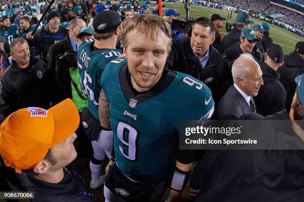 Philadelphia Eagles quarterback Nick Foles celebrates with fans and teammates after the NFC Championship Game between the Minnesota Vikings and the...