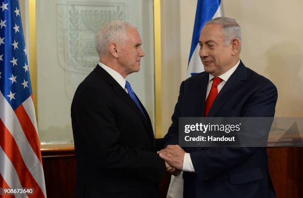 In this handout photo provided by the Israel Government Press Office , US vice President Mike Pence meets with Israeli Prime Minister Benjamin...