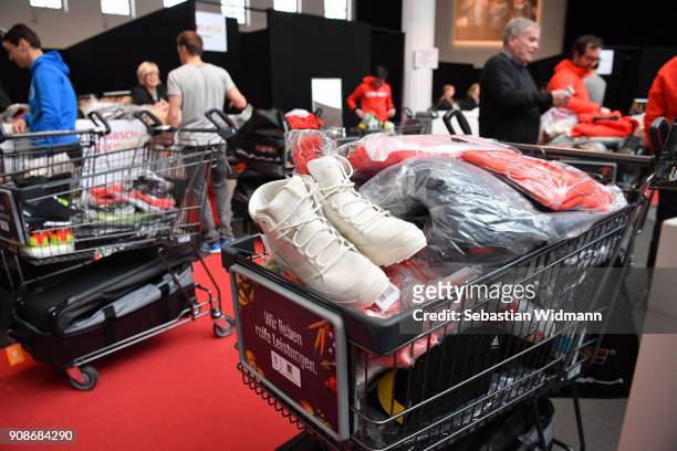 Shopping cart filled with clothes is seen during the 2018 PyeongChang Olympic Games German Team kit handover at Postpalast on January 22, 2018 in...