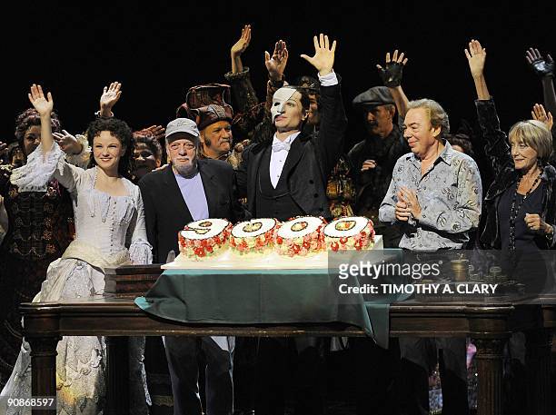 Actress Jennifer Hope Wills, director Harold Prince, actor John Cudia, composer Andrew Lloyd Webber and choreographer Gillian Lynne wave to the...