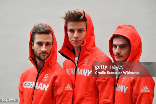 Markus Eisenbichler , Andreas Wellinger and Richard Freitag pose for a photo during the 2018 PyeongChang Olympic Games German Team kit handover at...