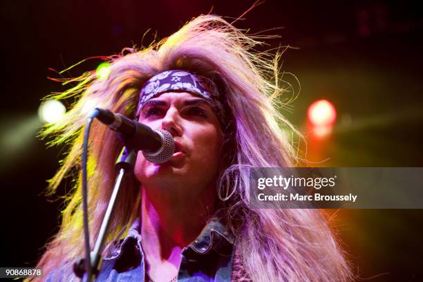 Lexxi Foxx of Steel Panther perform on stage at Shepherds Bush Empire on September 16, 2009 in London, England.