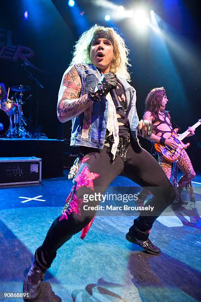 Michael Starr and Satchel of Steel Panther perform on stage at Shepherds Bush Empire on September 16, 2009 in London, England.