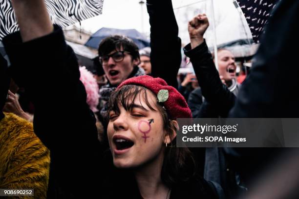 Woman seen shouting slogans during the march. Scores of women across the United Kingdom took to the streets on Sunday to protest sexual harassment...