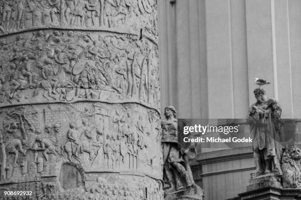 close up of trajan column with statues behind - trajan's forum stock pictures, royalty-free photos & images