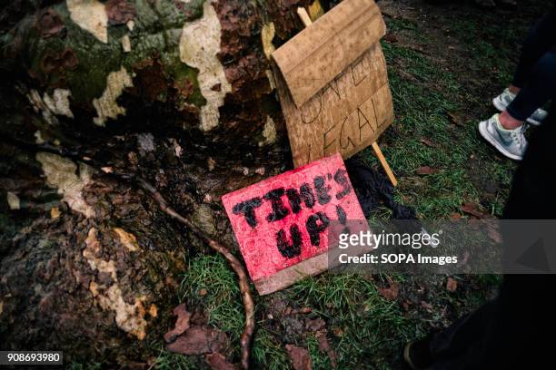 Several placards and poster lying down the floor seen during the march. Scores of women across the United Kingdom took to the streets on Sunday to...