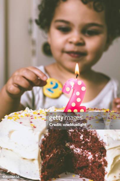 people: two years old birthday girl - onebluelight stock pictures, royalty-free photos & images