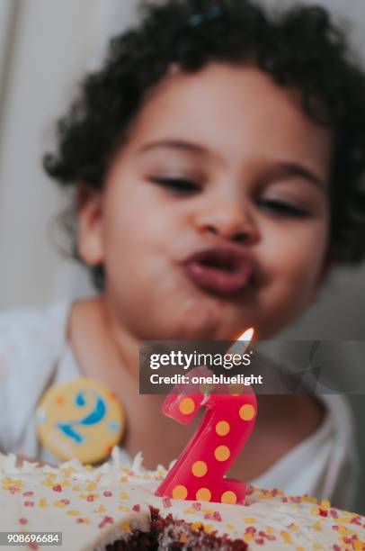 people: two years old birthday girl - onebluelight stock pictures, royalty-free photos & images