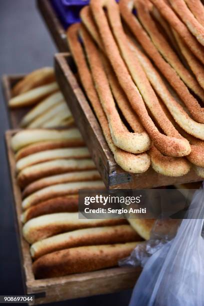 jordanian bread with sesame seeds in amman, jordan - amman foto e immagini stock