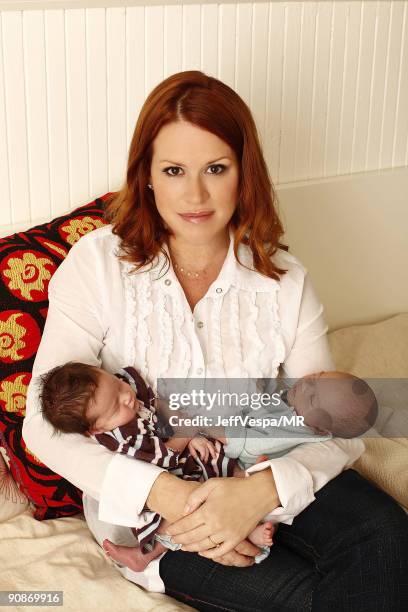 Molly Ringwald poses with her new twins Adele Georgina and Roman Stylianos during a photo shoot on July 29, 2009 in Los Angeles, California.