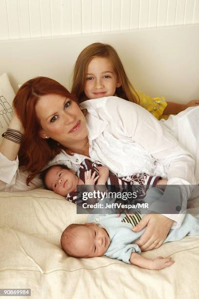 Molly Ringwald poses with her newborn twins Adele Georgina and Roman Stylianos and daughter Mathilda Ereni during a photo shoot on July 29, 2009 in...