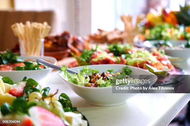 salads and snacks on a table - banquet stock pictures, royalty-free photos & images