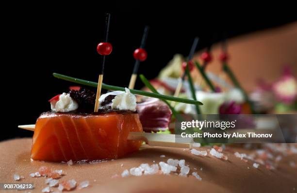 salmon canapes - nyotaimori stock pictures, royalty-free photos & images