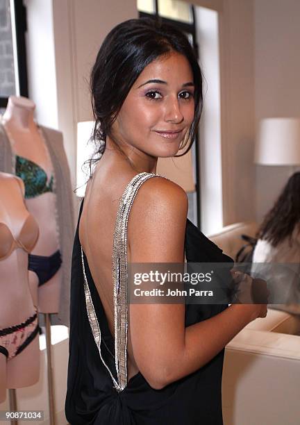 Actress Emmanuelle Chriqui attends the Victoria's Secret Fashion Week Suite at Bryant Park Hotel on September 16, 2009 in New York City.