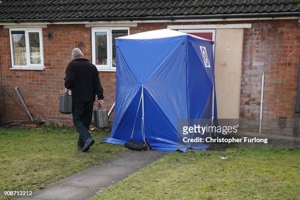 Forensic scientist works outside a home in Valley View, Brownhills, Walsall, where Mylee Billingham aged eight, was stabbed and later died in...