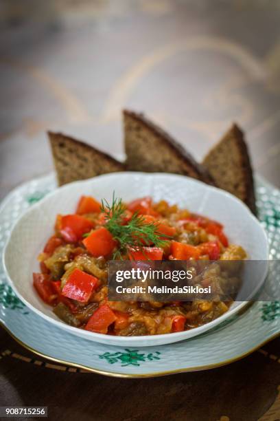 baked eggplant and paprika salad - canap�� stock-fotos und bilder