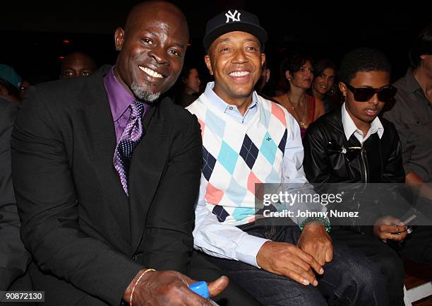 Djimon Hounsou, Russell Simmons and Daniel "Diggy" Simmons attend the Baby Phat & KLS Collection Spring 2010 during Mercedes-Benz Fashion Week at...