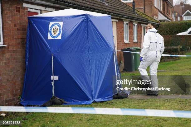 Forensic scientists work outside a home in Valley View, Brownhills, Walsall, where Mylee Billingham, aged eight, was stabbed and later died in...