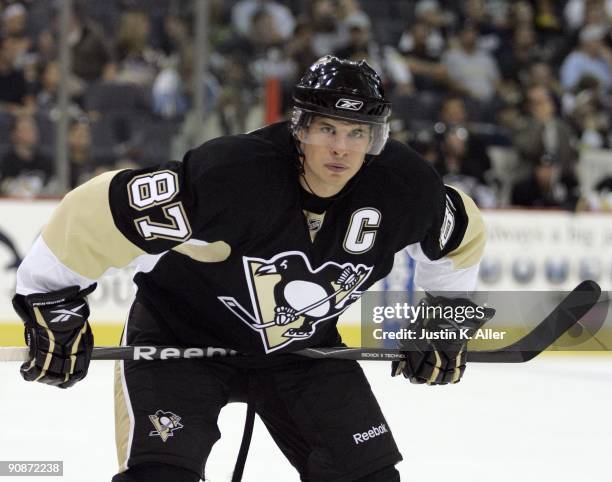 Sidney Crosby of the Pittsburgh Penguins prepares for a face-off against the Columbus Blue Jackets at Mellon Arena on September 15, 2009 in...