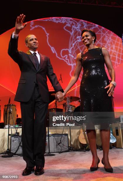 President Barack Obama and First Lady Michelle Obama attend the Congressional Hispanic Caucus Institute dinner September 16, 2009 in Washington, DC....